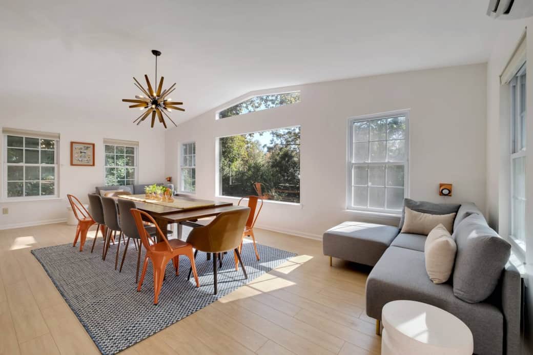 Dining for up to 12 guests and 2 modular sectionals to for comfort when not dining.