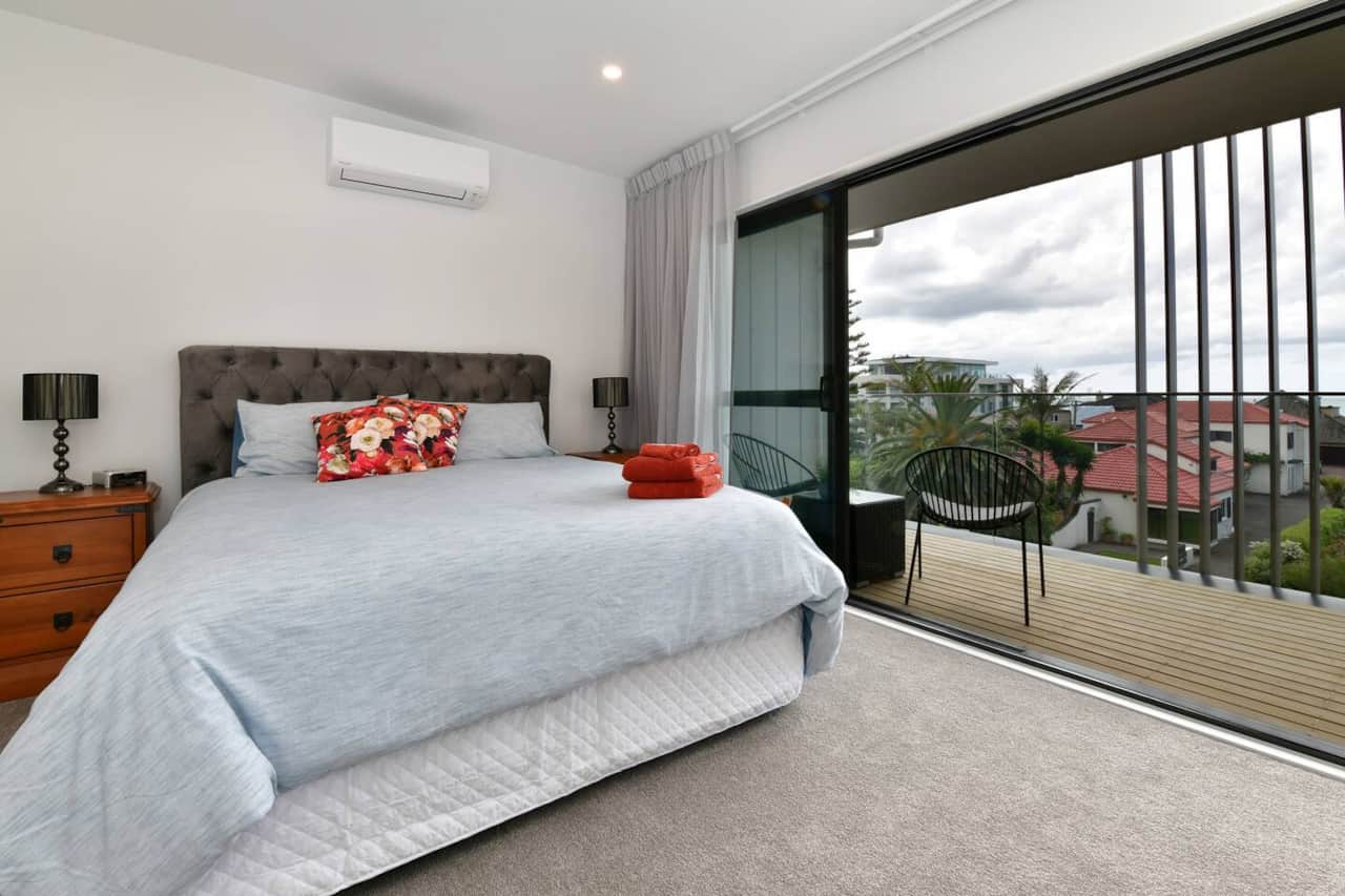 Master bedroom with a super comfy King bed. Great views of Orewa Beach from this room (Level 3)..