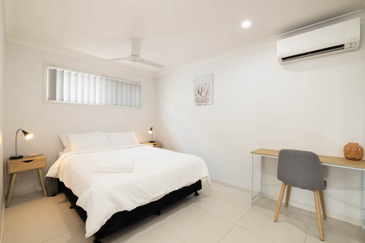 Bedroom: Peaceful bedroom with cozy design and ample storage 