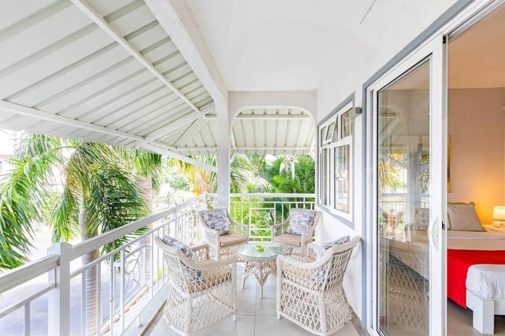 Spacious balcony overlooking the back garden and road
