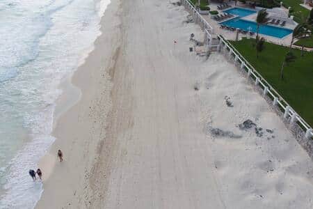 Drone shot of the beach. Because we're a private community, it's generally private. Drone shot of the beach. Because we're a private community, it's generally private.