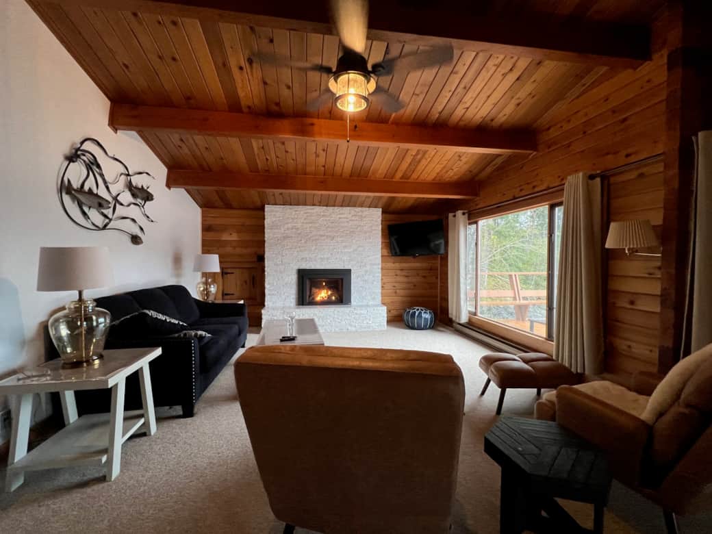 Living room with fan and gas fireplace