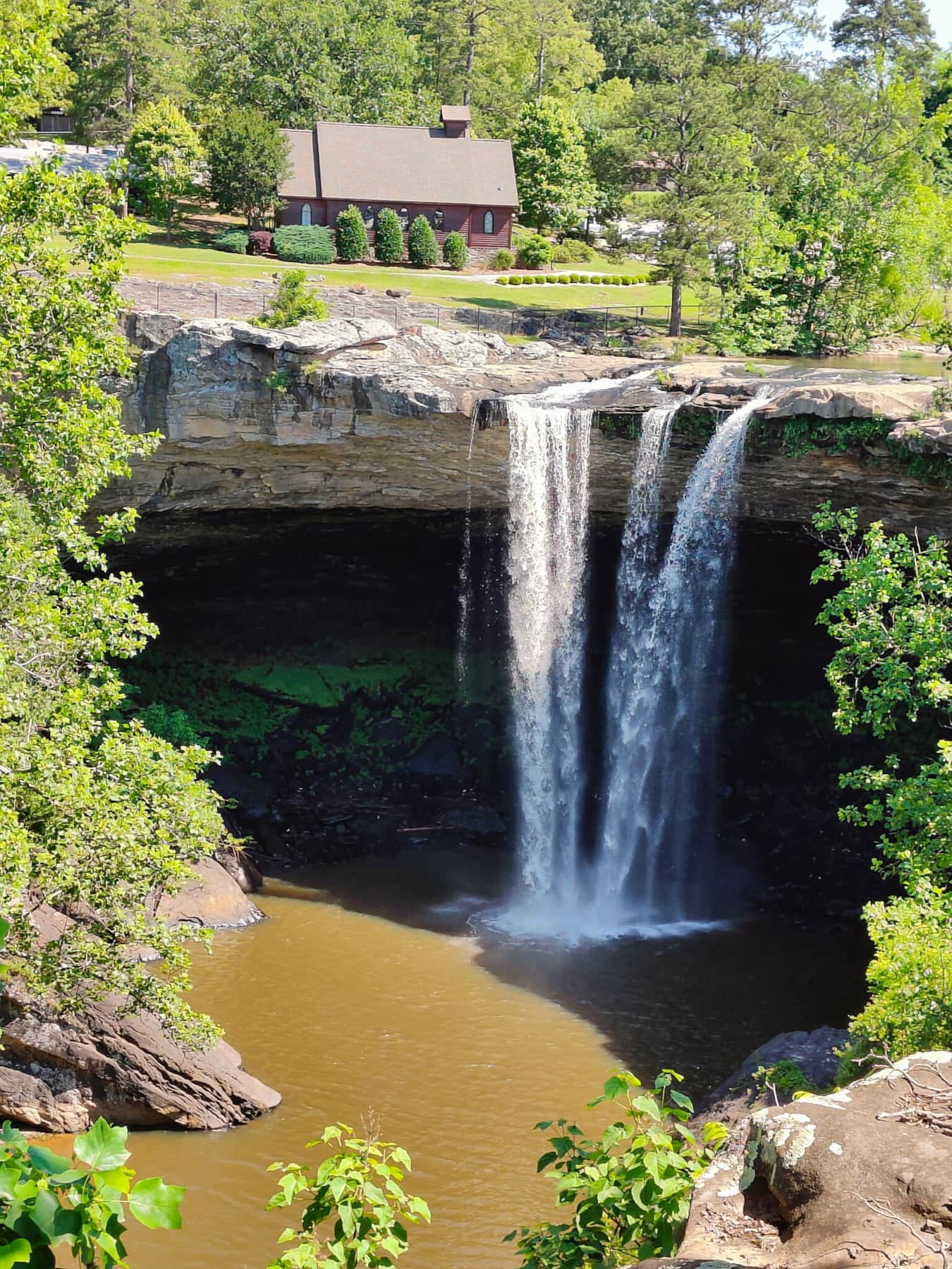 Noccalula Falls...Alabama's #1 Tourist Site You are only 2.1 miles from the beautiful Noccalula Falls where mother nature awaits you. Explore the many trails for hiking or bike riding. Have fun on a train ride that takes you through the majestic park or stroll at your own leisure and don't forget to stop at the souvenir shop for that perfect gift! Noccalula Falls...Alabama's #1 Tourist Site You are only 2.1 miles from the beautiful Noccalula Falls where mother nature awaits you. Explore the many trails for hiking or bike riding. Have fun on a train ride that takes you through the majestic park or stroll at your own leisure and don't forget to stop at the souvenir shop for that perfect gift!