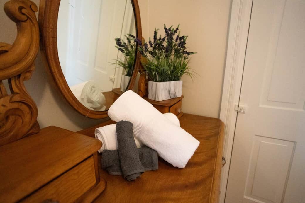 Fresh linens, fluffy towels, and thoughtful guest touches