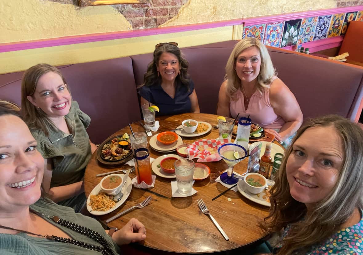 Friends enjoying lunch and margaritas at Taquilo's on Postoffice, one of the places to try during Galveston Restaurant Week.