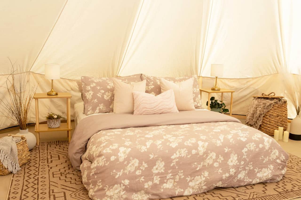 A Romantic Queen Bed with Soft, Feminine Details