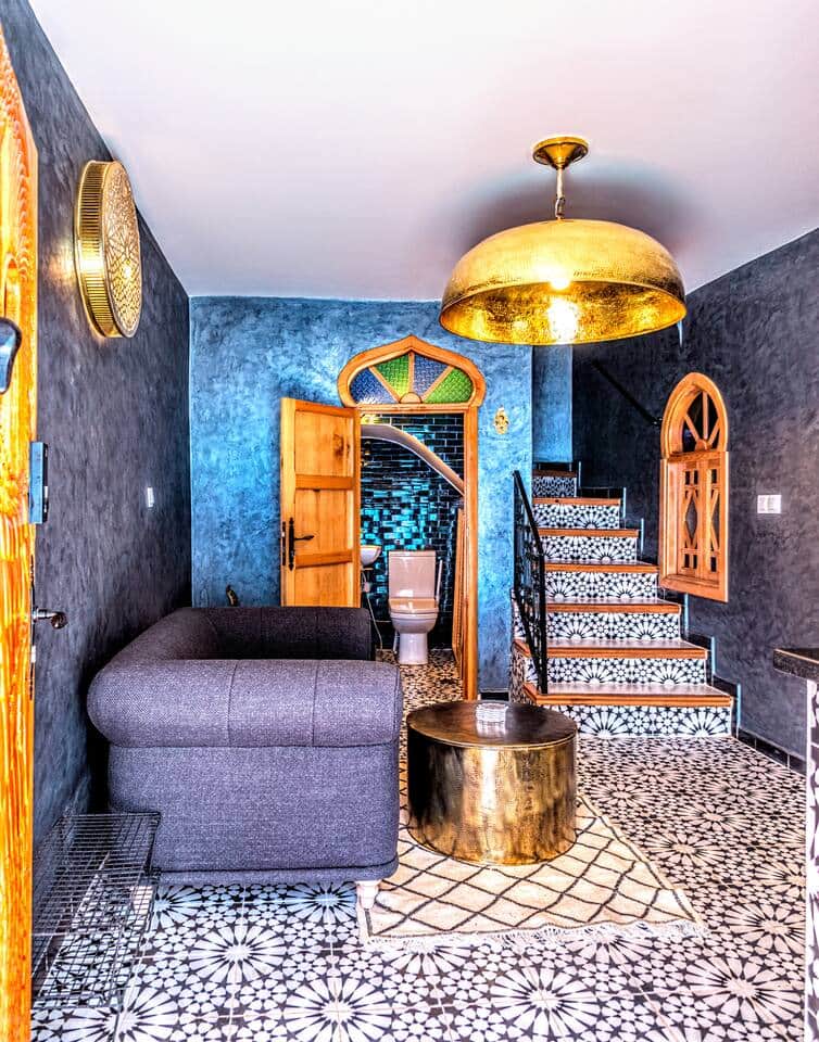 Adjacent to the sitting area on Level 0 , you will find a charming half bathroom. Decorated in traditional Moroccan style, this small yet inviting space features intricate tile work. Conveniently located next to the kitchen and dining room. Level 0 Adjacent to the sitting area on Level 0 , you will find a charming half bathroom. Decorated in traditional Moroccan style, this small yet inviting space features intricate tile work. Conveniently located next to the kitchen and dining room. Level 0