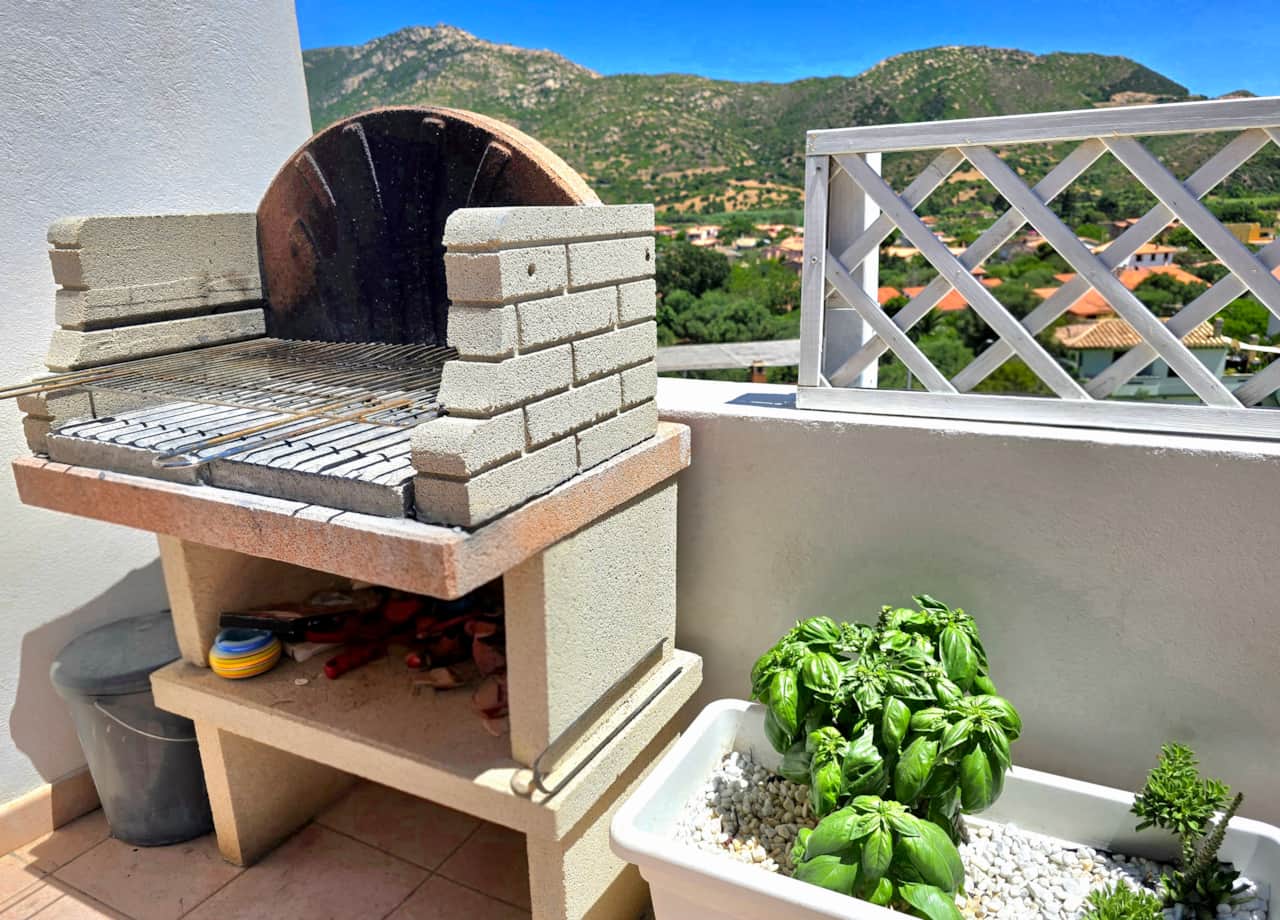 Private masonry barbecue on the terrace