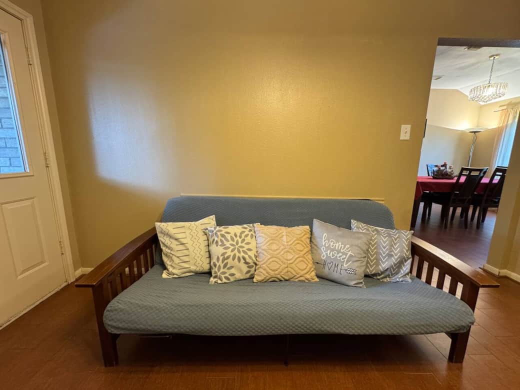 Secondary living room with comfy sofa sleeper for two. 
