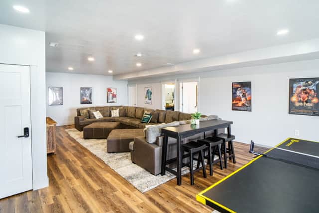 Come through the double glass doors from the parking area and enter the basement living area