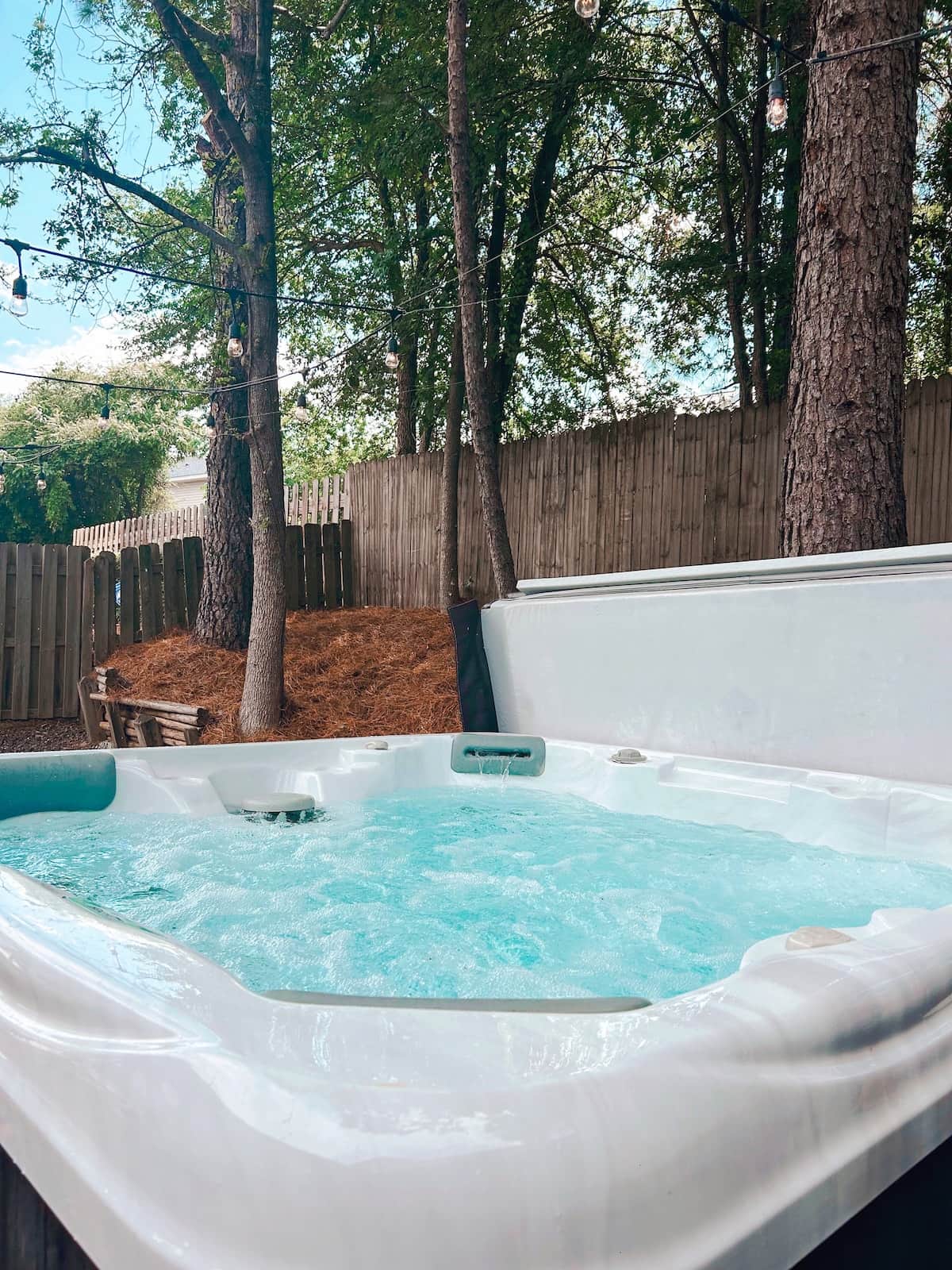 Luxury 4 persons hot tub  for your enjoyment located on the serene and spacious   back yard under majestic  pine trees! Please follow all the rules and instructions provided on the Airbnb app  prior  usage!