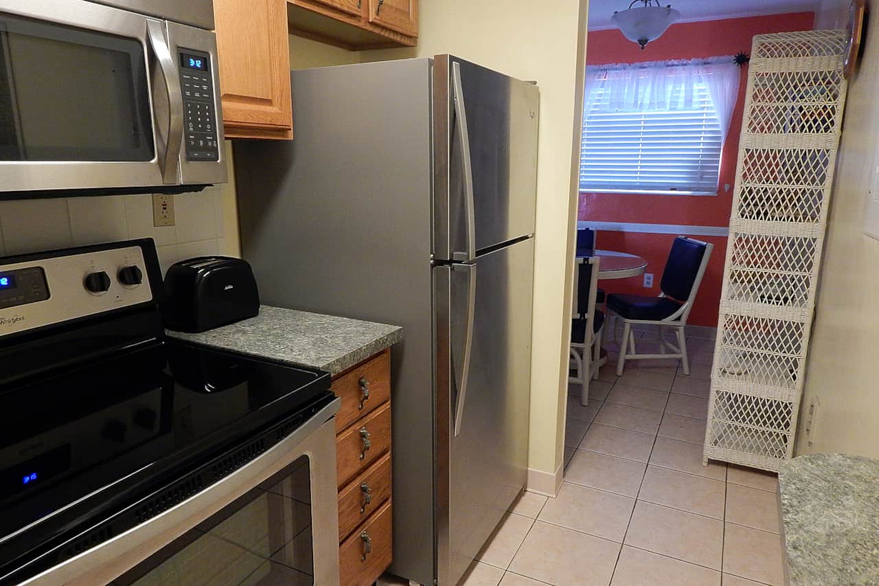 32 - Kitchen is stocked with essentials to complete a full meal. 