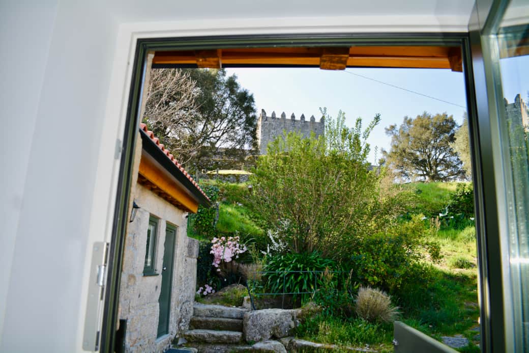 A view that's a work of art. The historic Lindoso Castle, perfectly framed from the cottage entrance