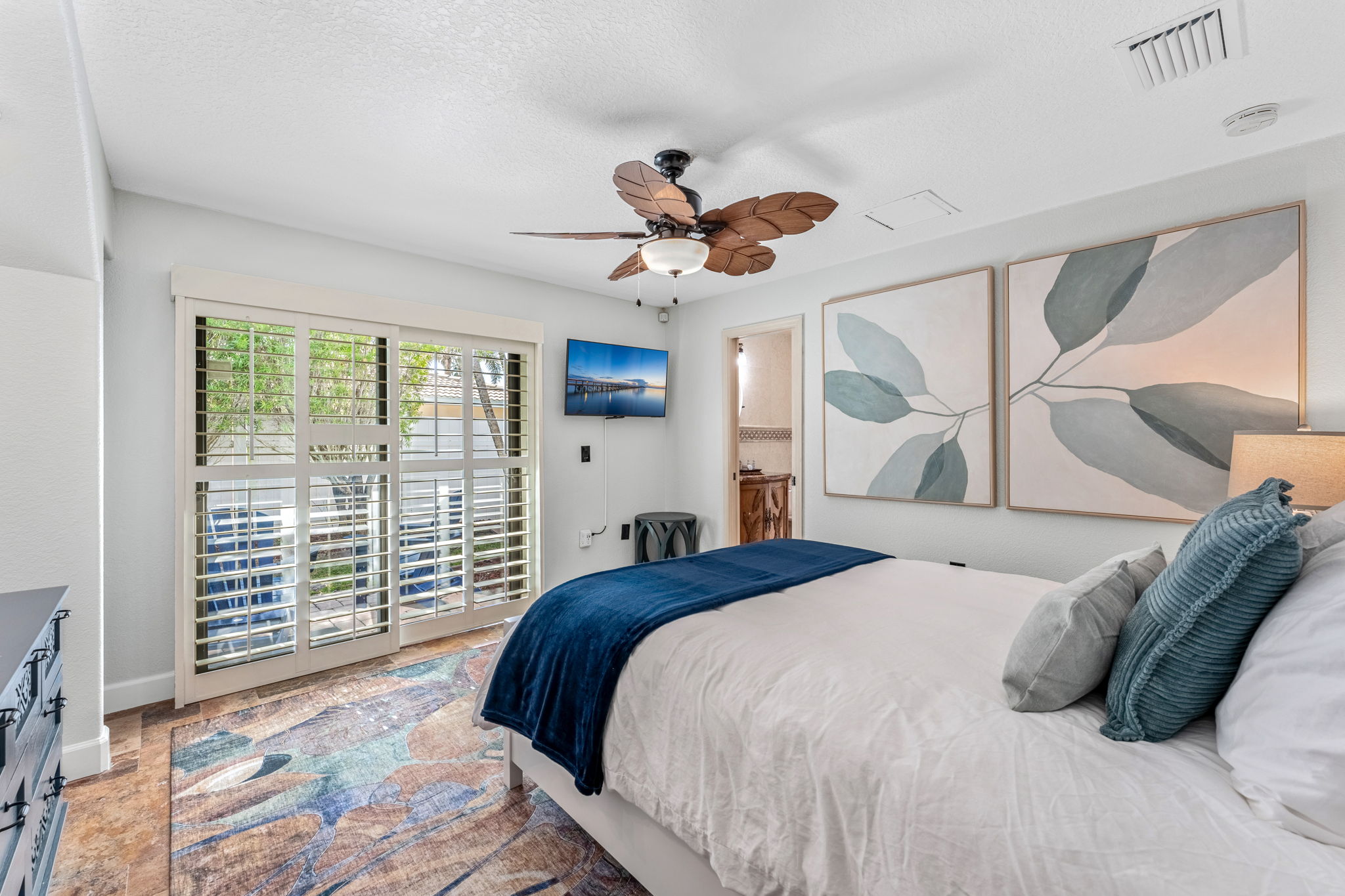 Sleep in serenity in bedroom 2, featuring a plush bed and calming decor.