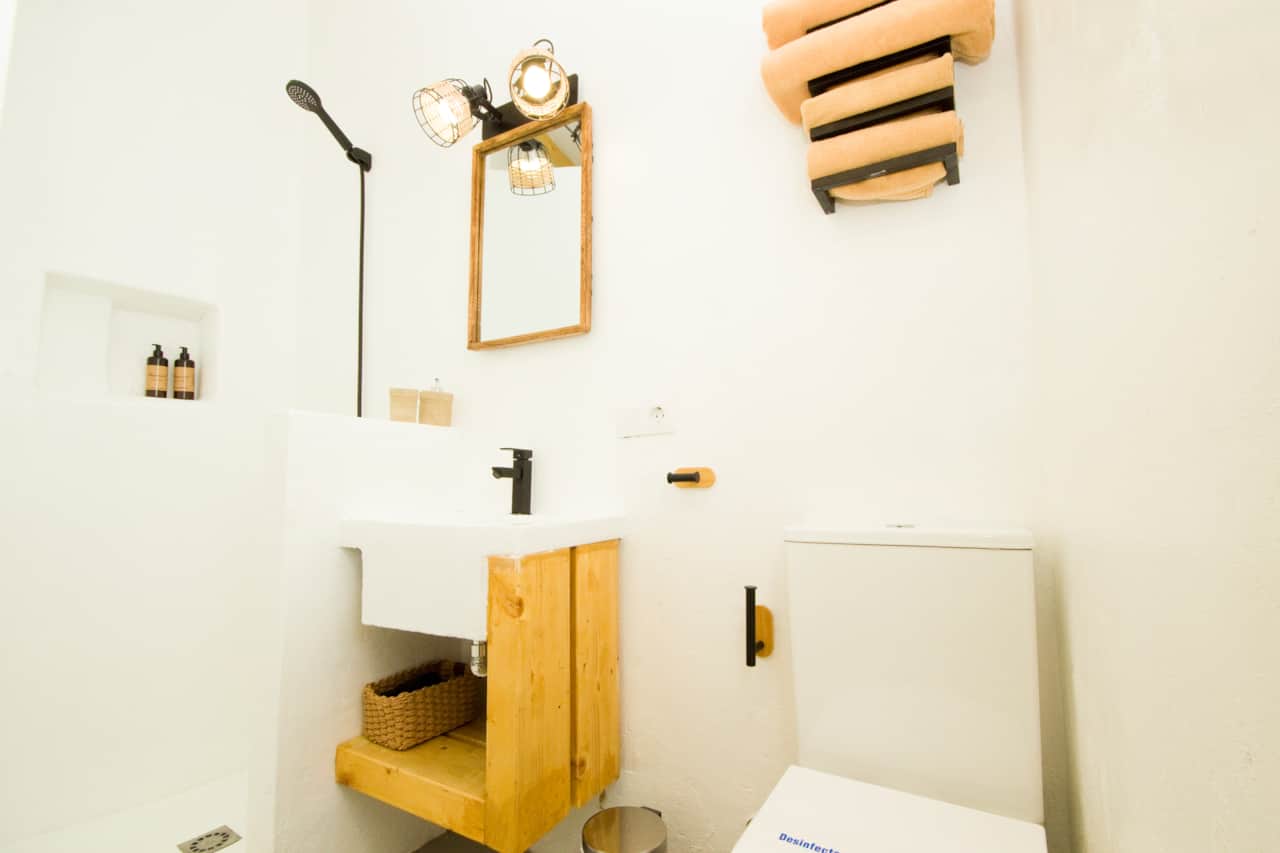 Spacious, light-filled bathroom with shower tray at El Charco Lofts 4 in Arrecife, by AZ Rental