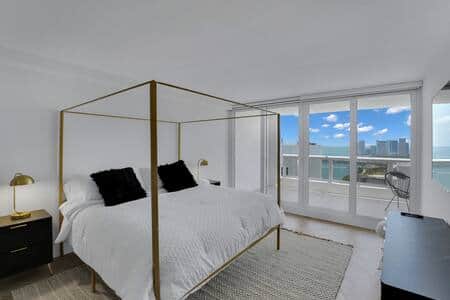 Master bedroom suite, king bed, streaming tv, balcony access, private bathroom