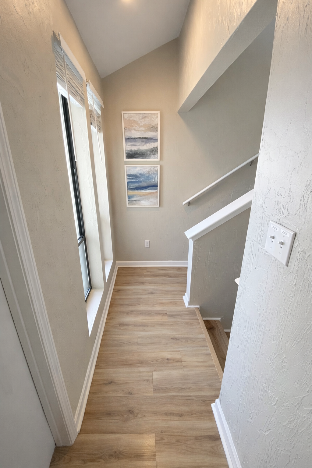 Guest Hallway that leads upstairs to the Bunk Room and Master Bedroom Suite.