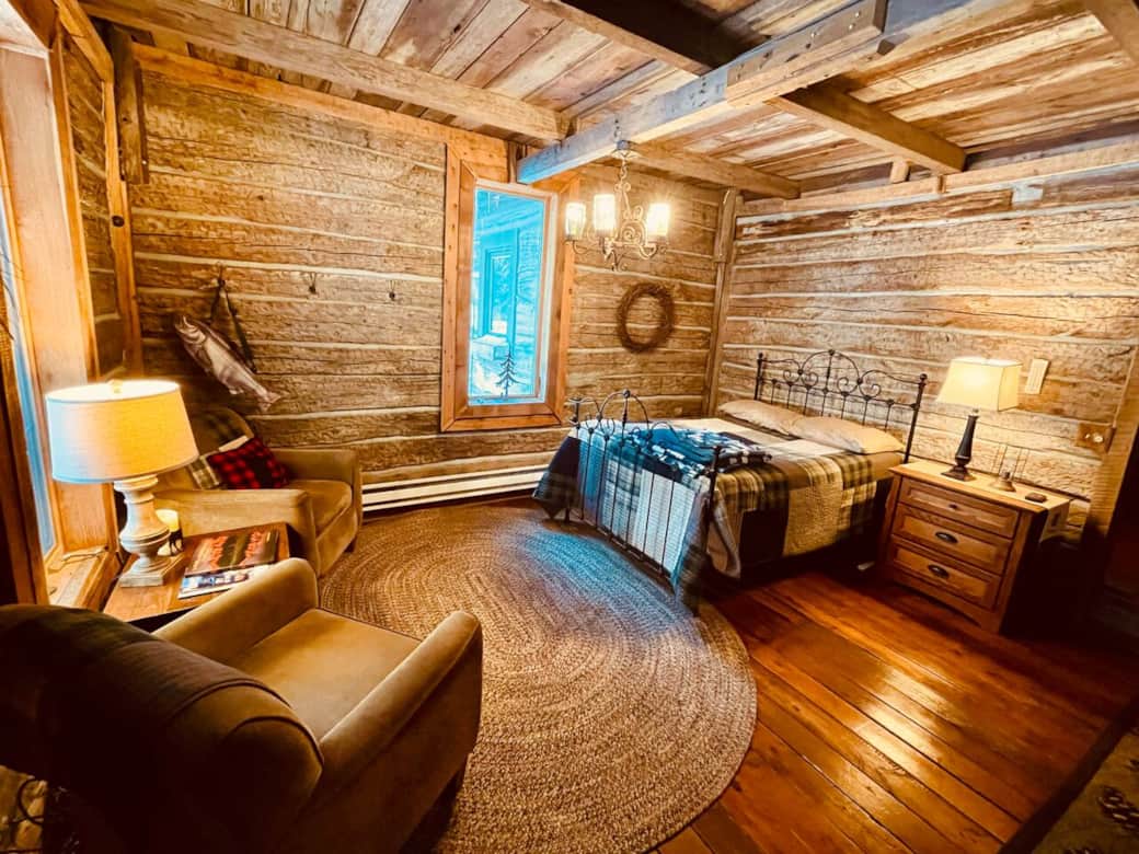 Cozy bed with sitting area.