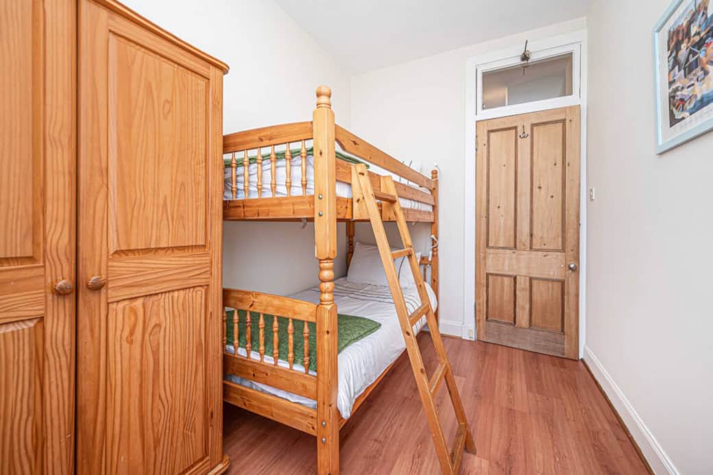 Bedroom 2 with full-size bunk beds