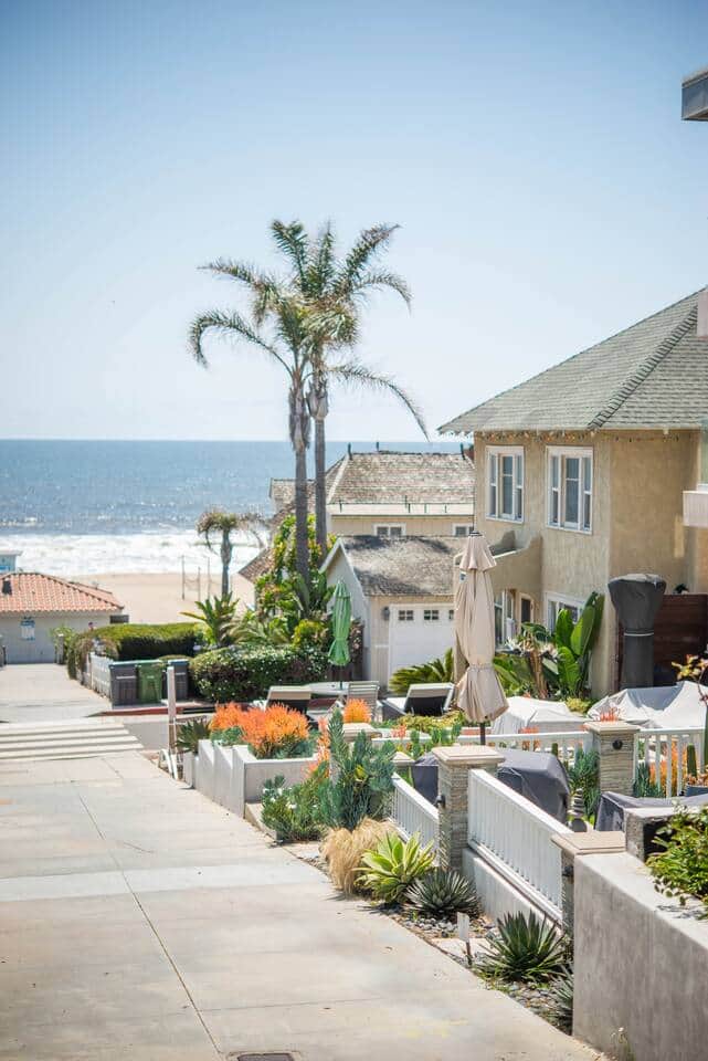 Being just four houses from the beach, the private front porch patio is on this walk-street providing a great place for a relaxing morning coffee or afternoon happy hour. Being just four houses from the beach, the private front porch patio is on this walk-street providing a great place for a relaxing morning coffee or afternoon happy hour.