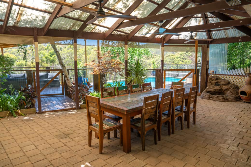 BBQ area with the pool deck in the background