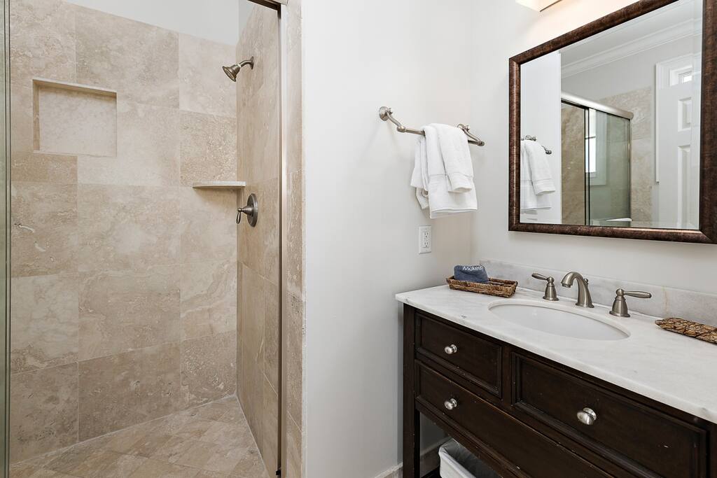 Ensuite attached to third floor bedroom.  Walk-in, tiled shower.