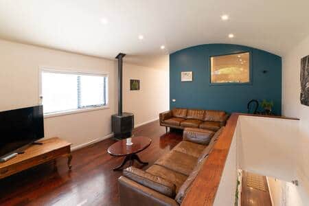 Upstairs Living area with gas log fire