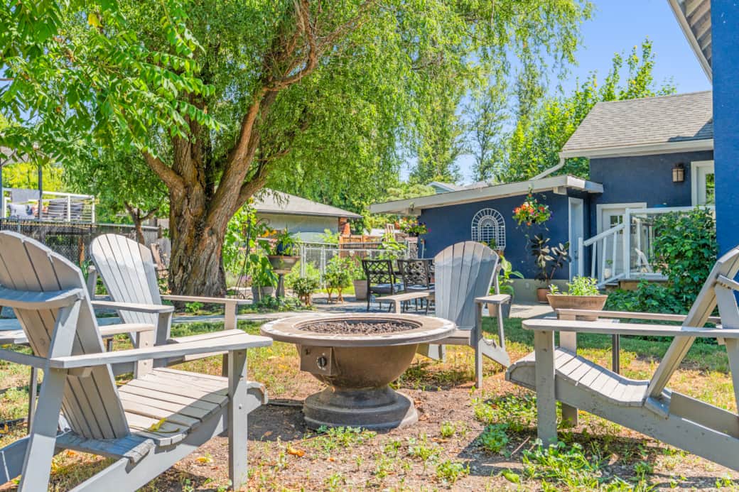 Adirondack chairs with propane fire pit.