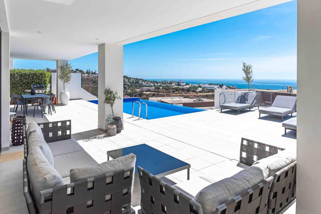 From the covered terrace and pool chill out area 