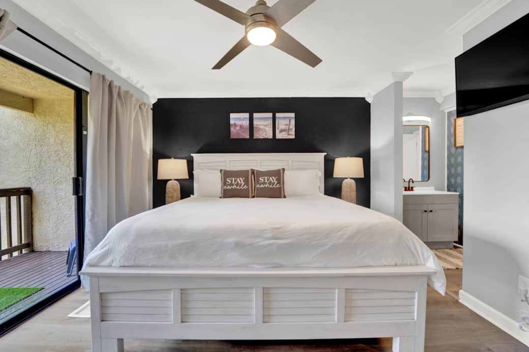 Primary, comfy King with fresh white pillows and sheets