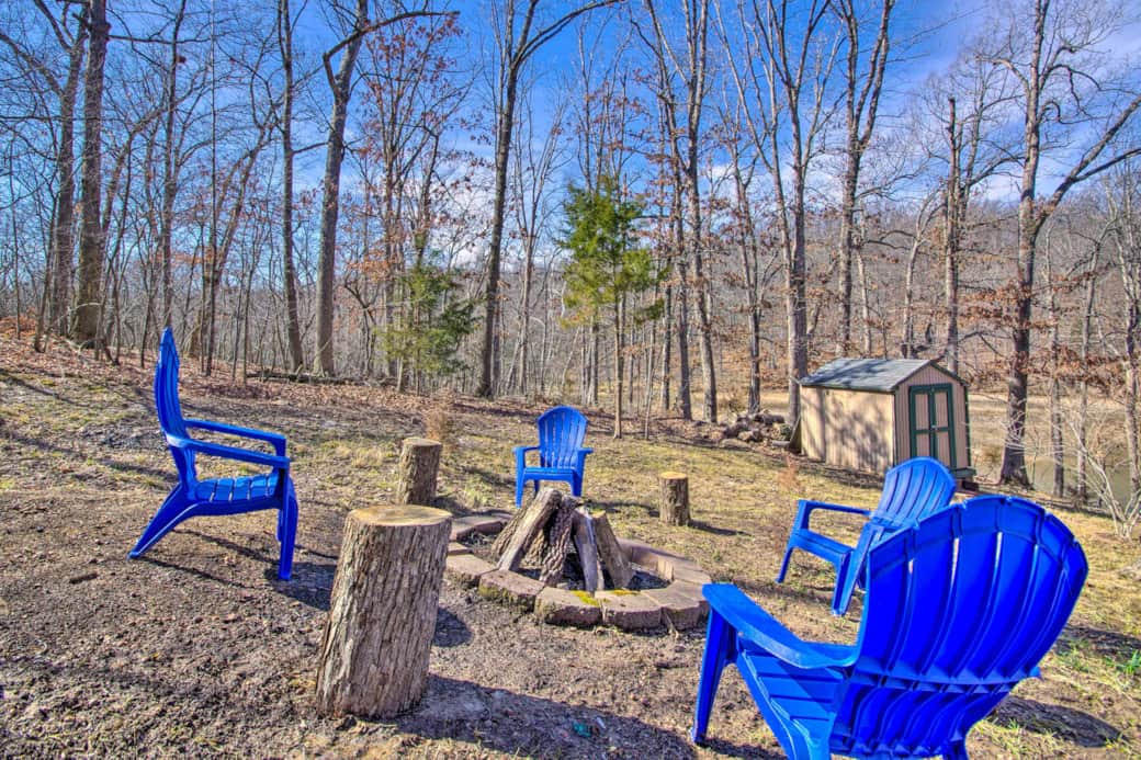 Fire pit with Adirondack Chairs  make for a relaxing camp fire 