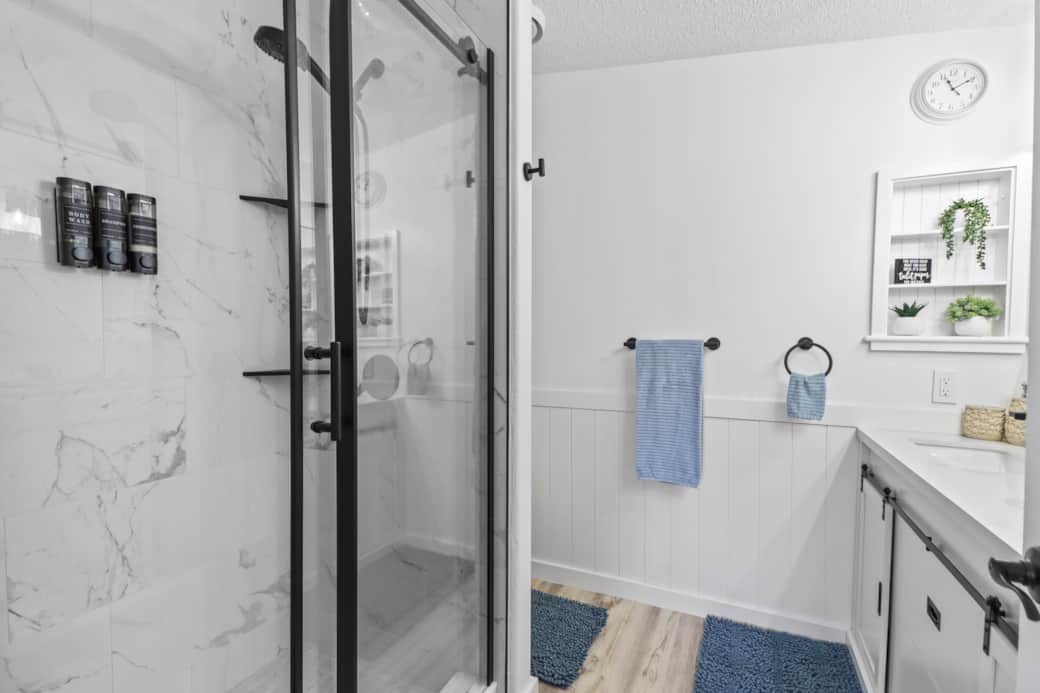 Ensuite master bathroom with a double sink vanity