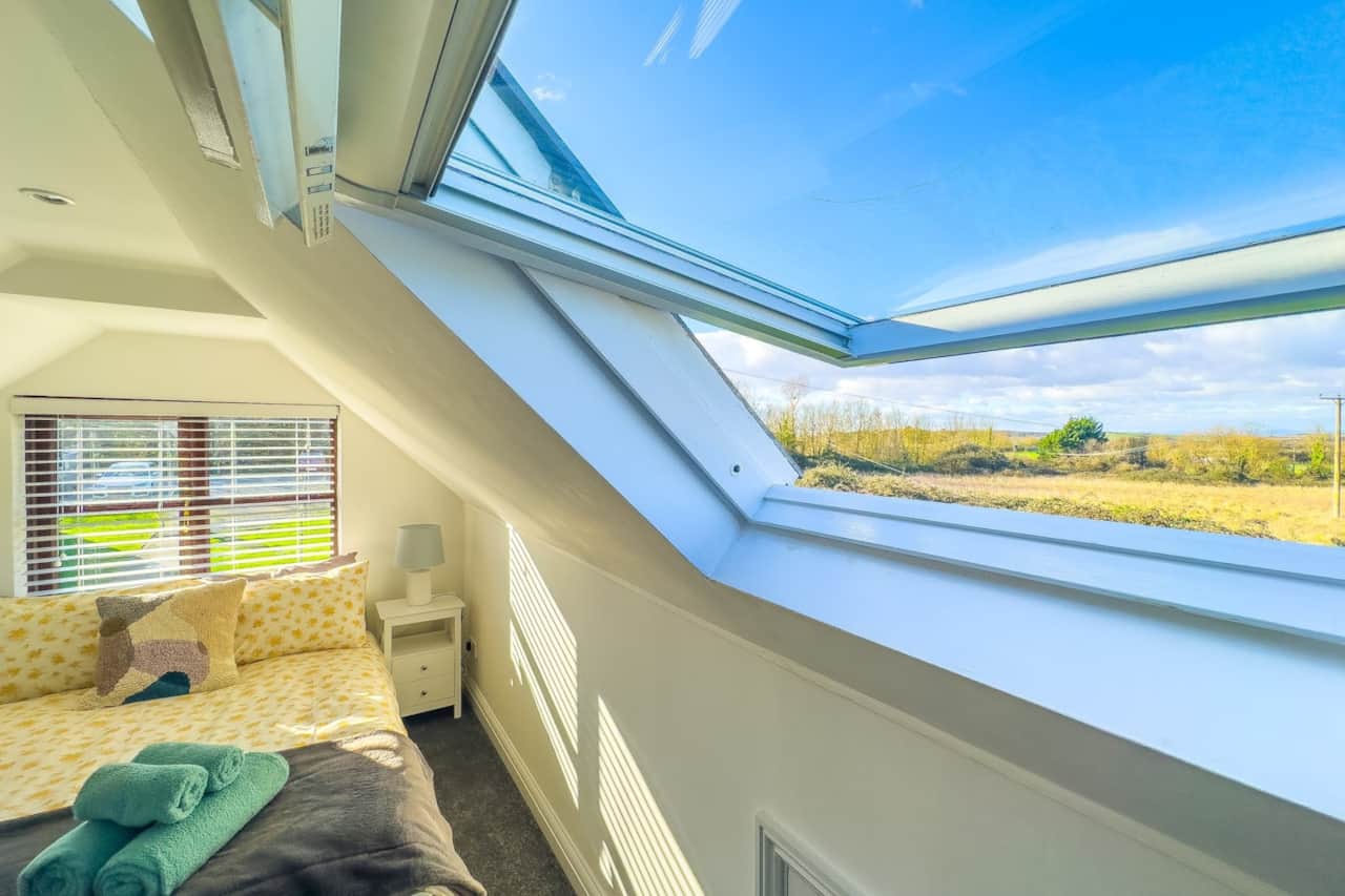 View from the bedroom overlooking the fields and National Trust's sandpoint behind