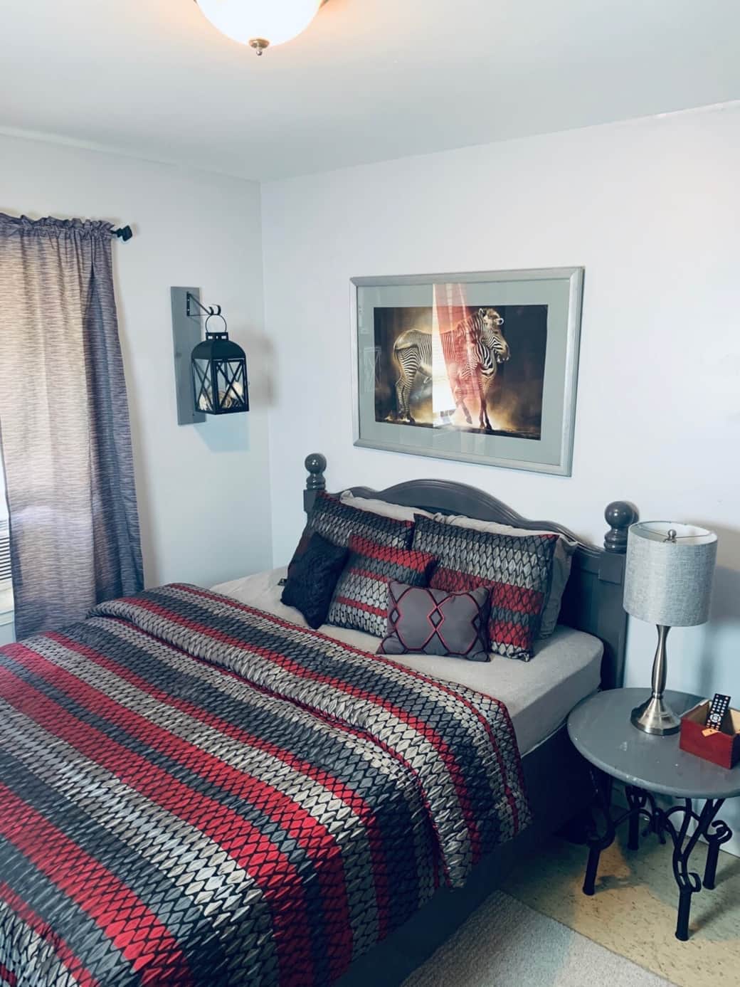 BEDROOM 3
 Queen bed and modern decor