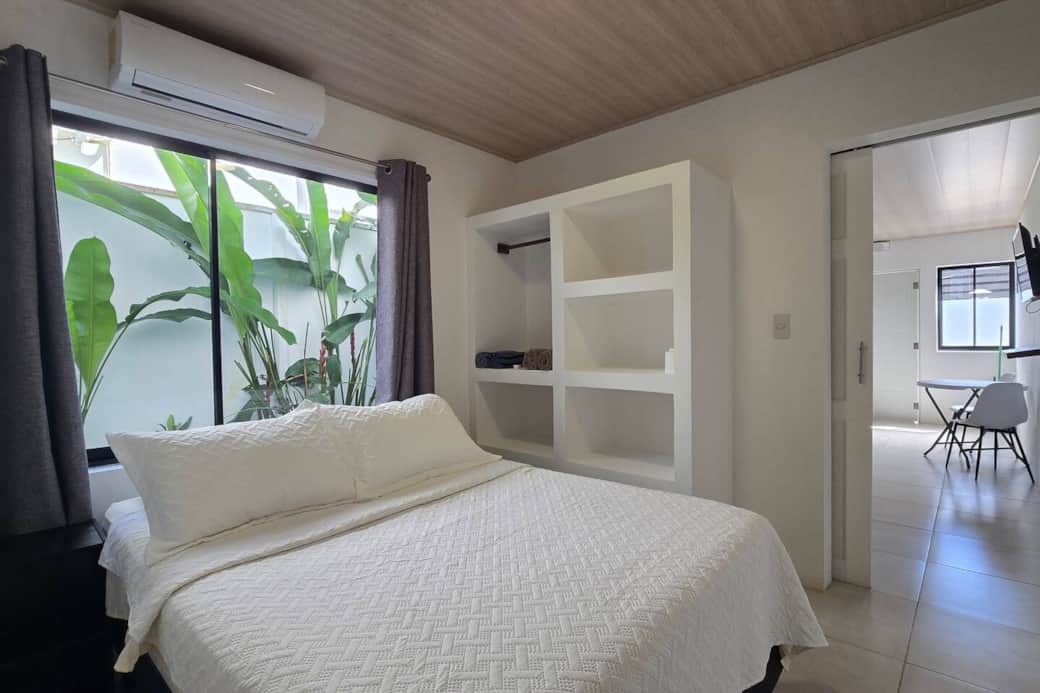 Bedroom with clothing storage Bedroom with clothing storage