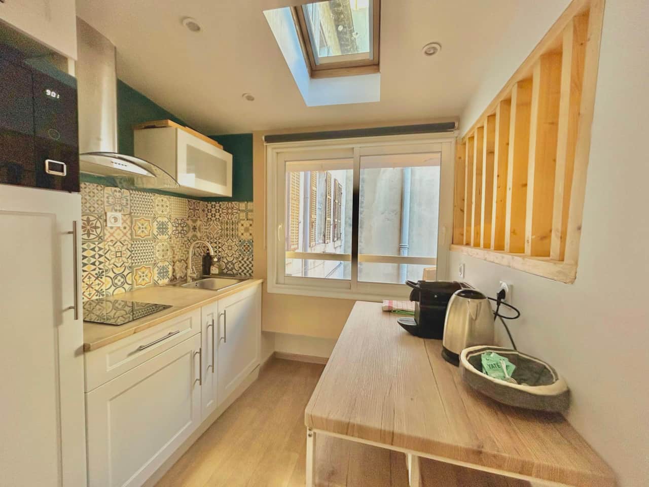 kitchen, microwave, coffee maker, kettle, stovetop