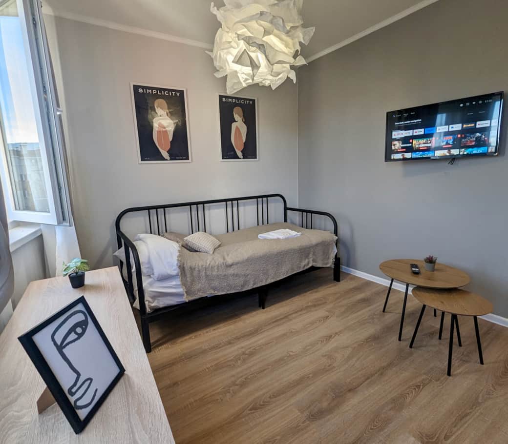 Very comfortable bed for one person like at home with a duvet, pillow and extra blanket.