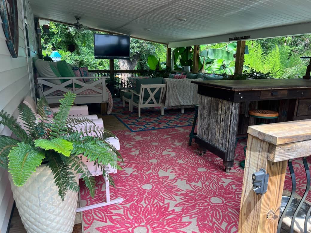 If you enjoy a cozy space to dine, relax or watch TV outdoors, this spot is for you. If you enjoy a cozy space to dine, relax or watch TV outdoors, this spot is for you.