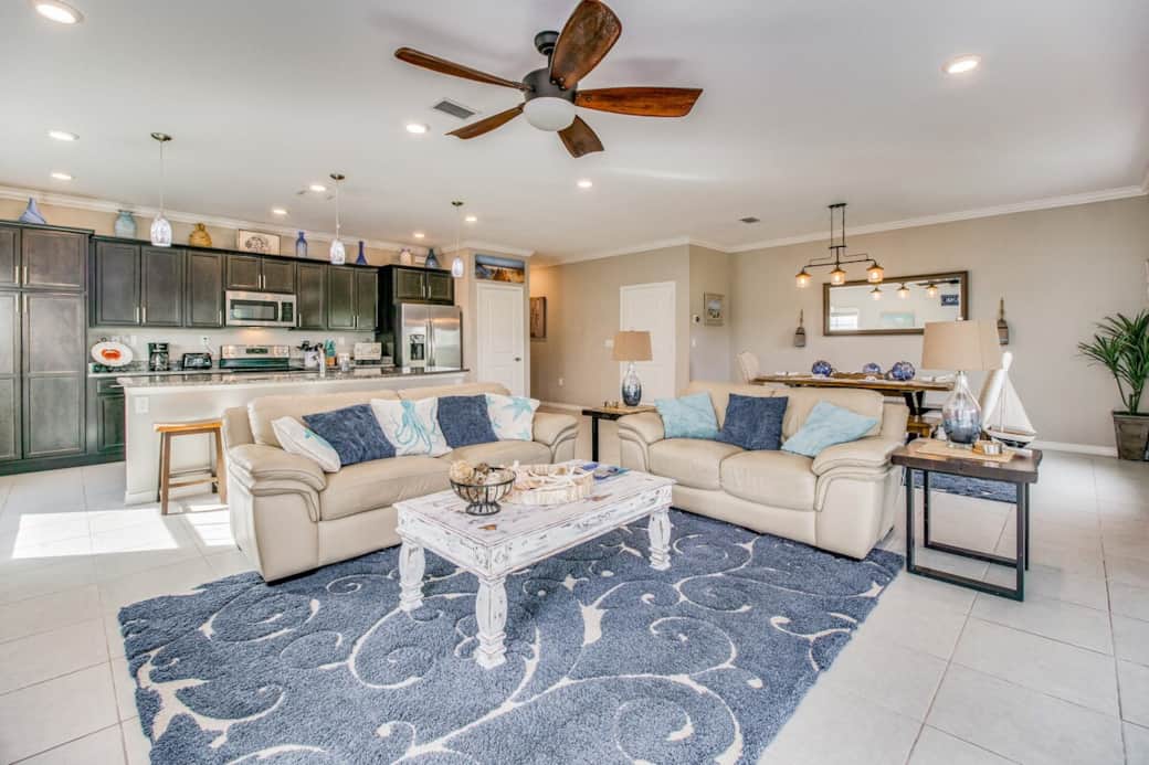 Family time abounds with our fully open main floor space. Double patio doors fully open to wonderful Florida sea air.