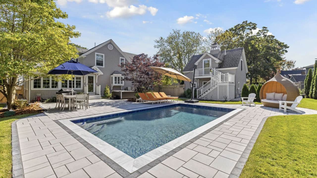 Stunning patio surrounding a salt water pool