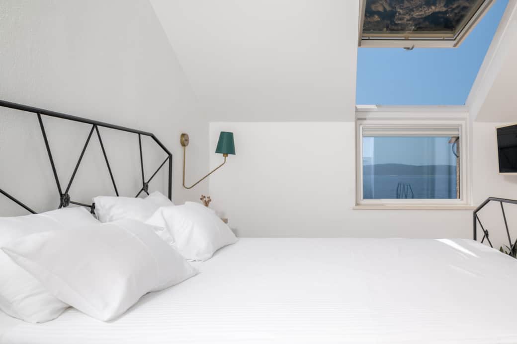 Wake up to this. Our East Bedroom, where the bed, sky, and sea meet. Wake up to this. Our East Bedroom, where the bed, sky, and sea meet.