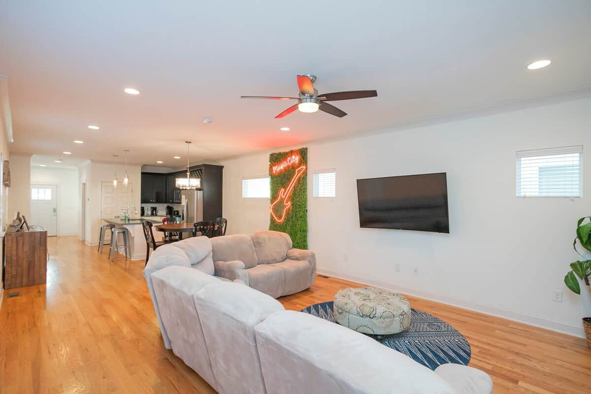 Kick back and relax in style! This cozy living room is perfect for movie nights on the 65” 4K Smart TV or catching up on your favorite shows with high-speed WiFi!