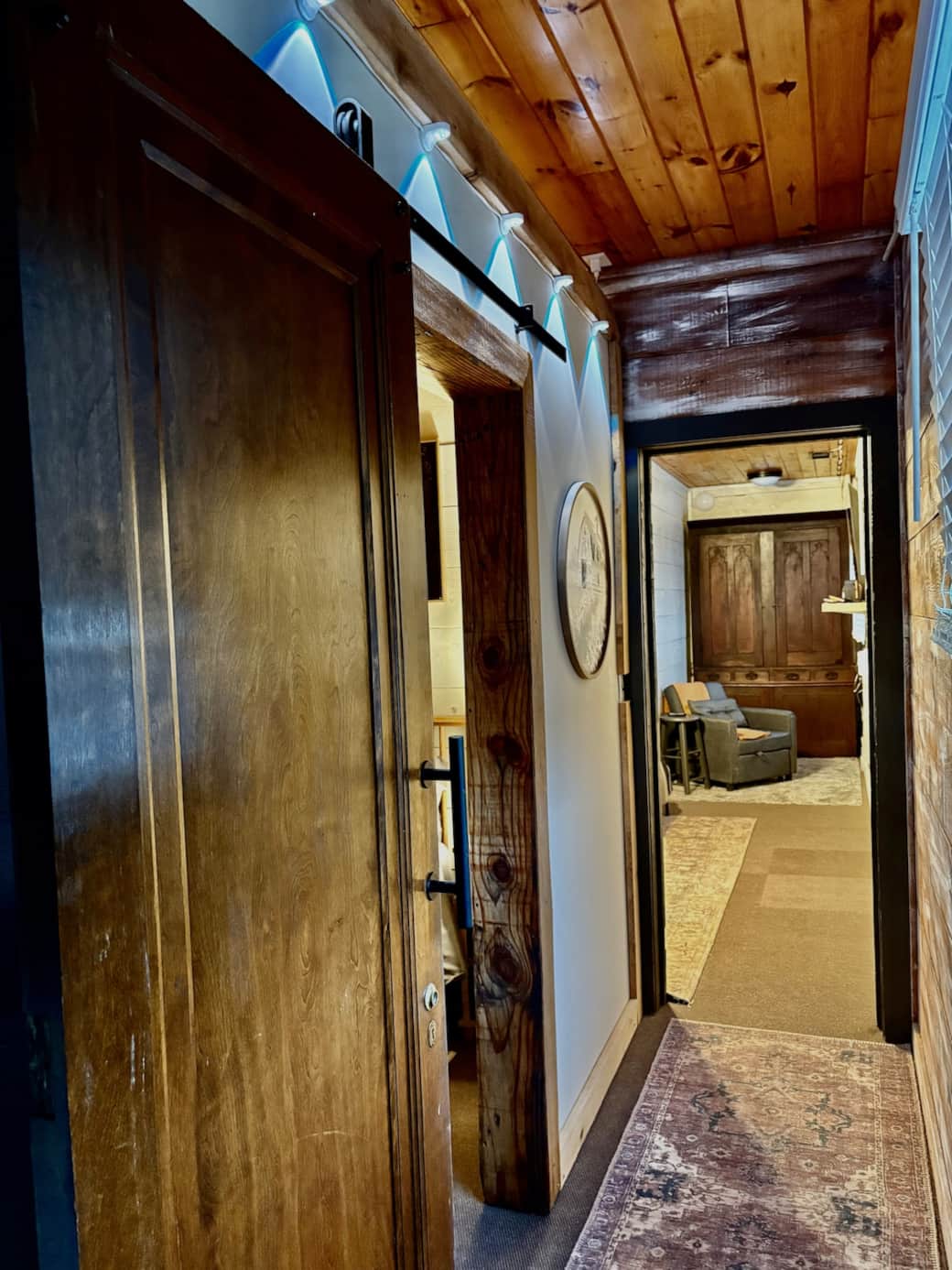 Hallway leading from the living room to the bedrooms and workspace. Hallway leading from the living room to the bedrooms and workspace.