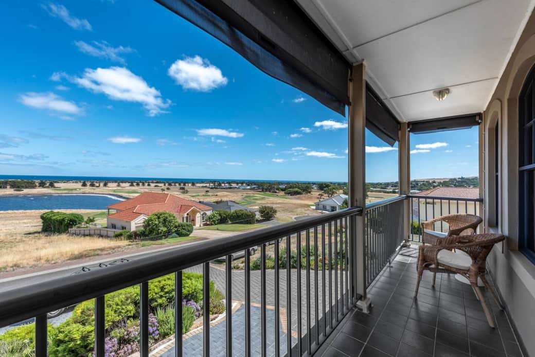 Balcony with sunset, beach and golf course views