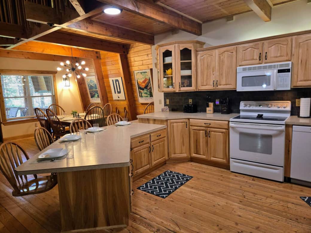 Gather together in the open concept kitchen and dining areas. Perfect for large gatherings and meals.