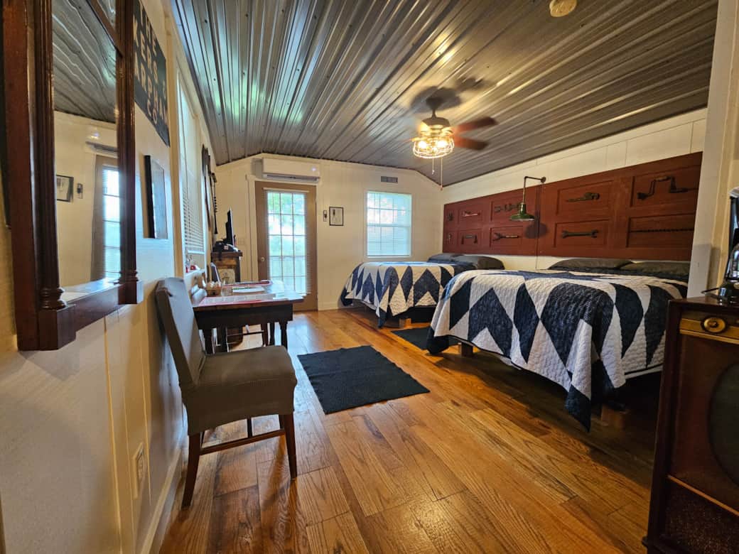 Studio Style Cabin with two full-sized beds, kitchenette, and bathroom. Studio Style Cabin with two full-sized beds, kitchenette, and bathroom.