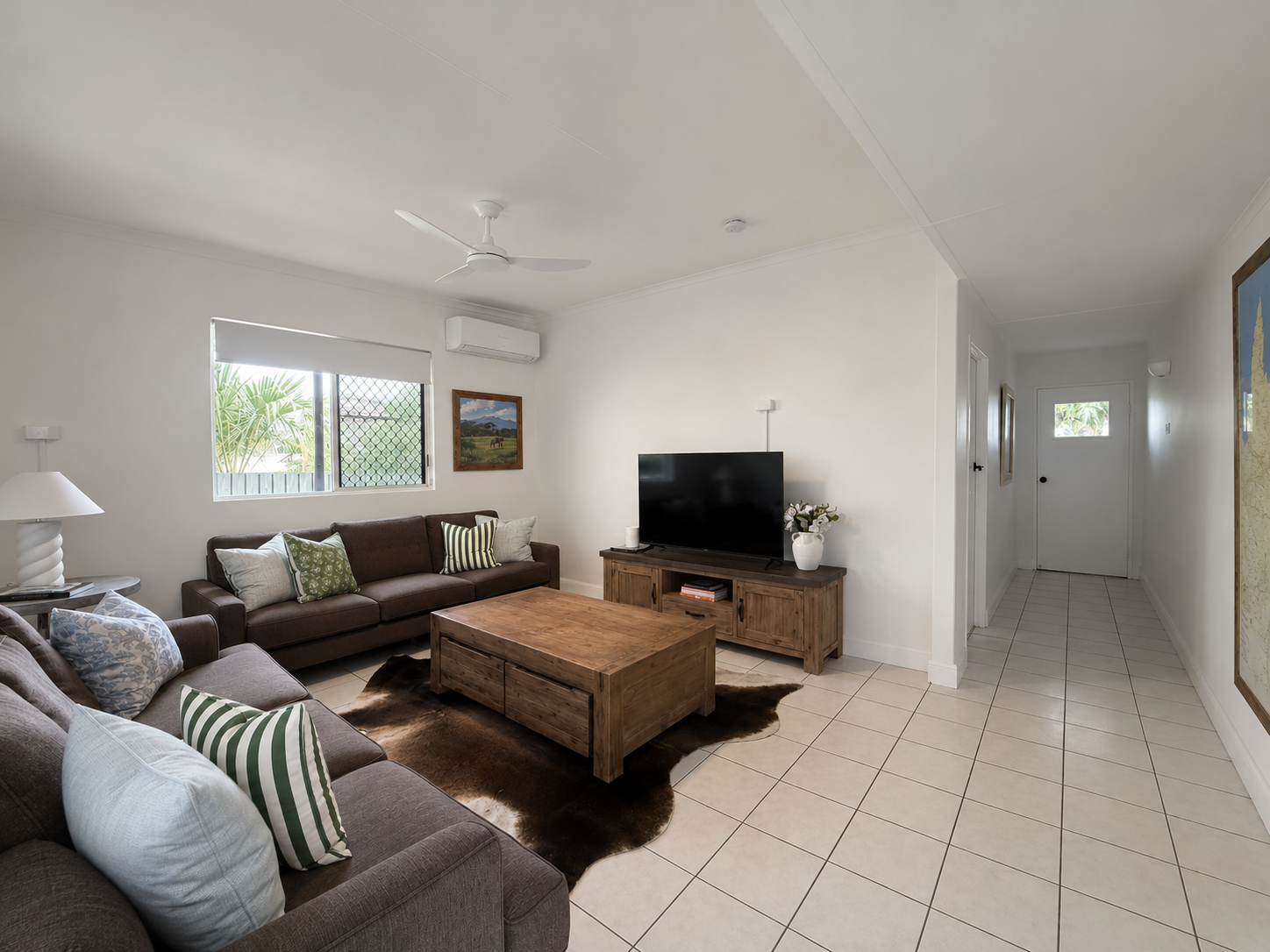 Relax with Smart TV, generous seating and light filled interiors.