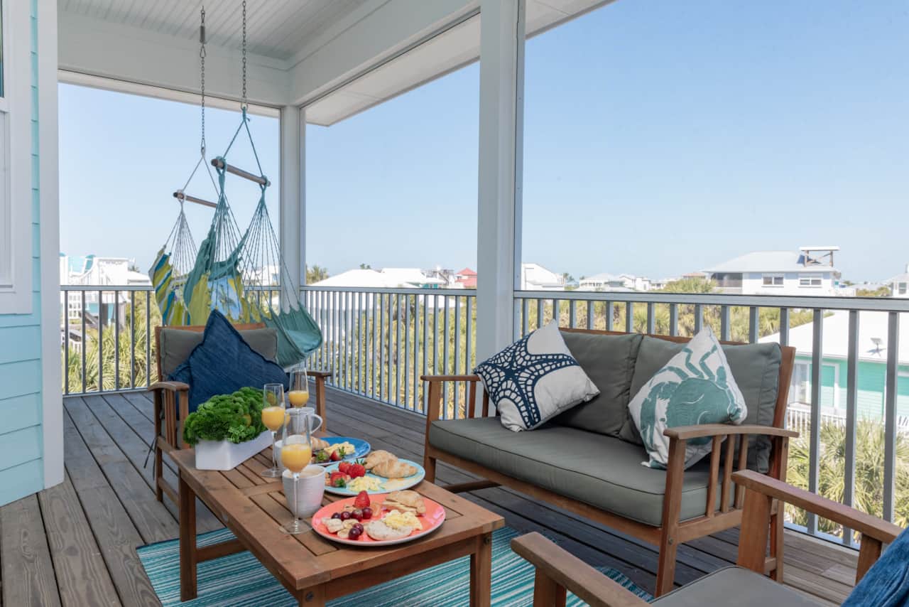 Fully Enclosed 3rd Floor Patio with Seating and Hammock Chairs