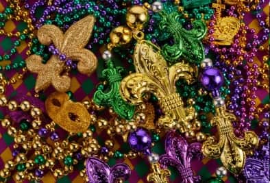 Mardi Gras beads being thrown from a parade float in Galveston