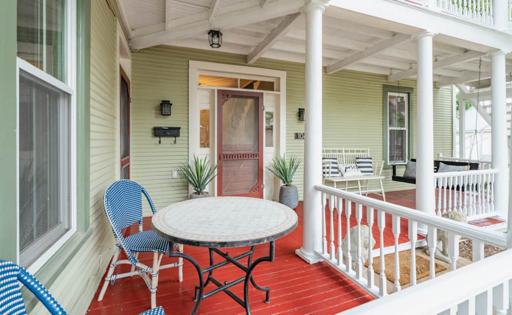 Porch swing perfect for your morning coffee or evening glass of wine Porch swing perfect for your morning coffee or evening glass of wine